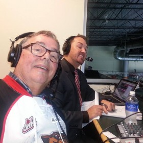 Dan and his dad in the Cougar's broadcast booth