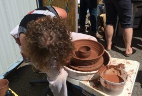 Making pottery at the annual Spring Arts Bazaar