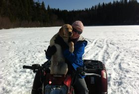 Alexandra quading with her puppy