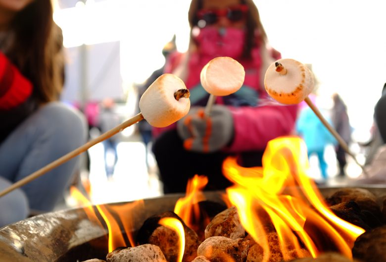 Roasting marshmallows over a fire