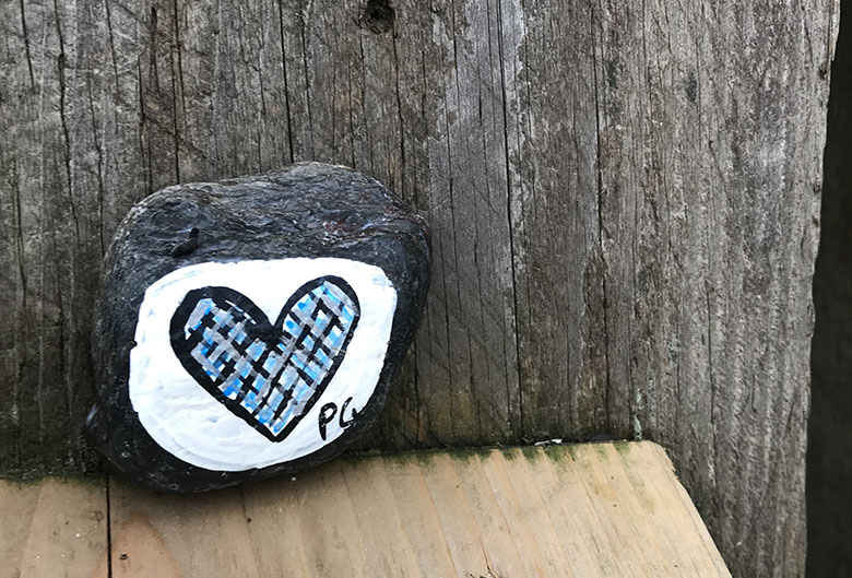 Rock with a heart painted on it.